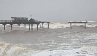 Teignmouth Grand Pier partly destroyed amid severe Storm Ingrid