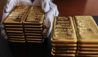 Gold price hits historic high, reaches $5,000 per ounce