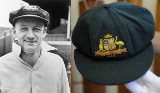 Don Bradman's iconic baggy green cap sells for record price at auction