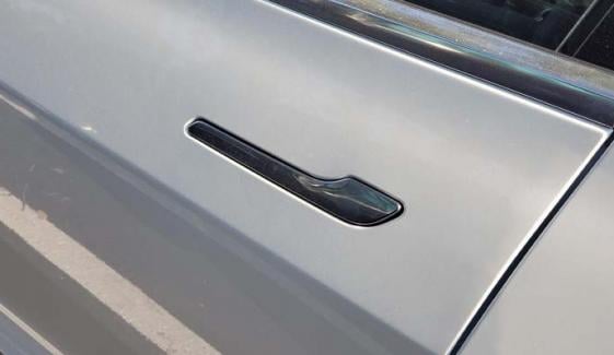 Tesla's sleek design receives major blow as China bans hidden EV door handles