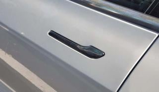 Tesla's sleek design receives major blow as China bans hidden EV door handles