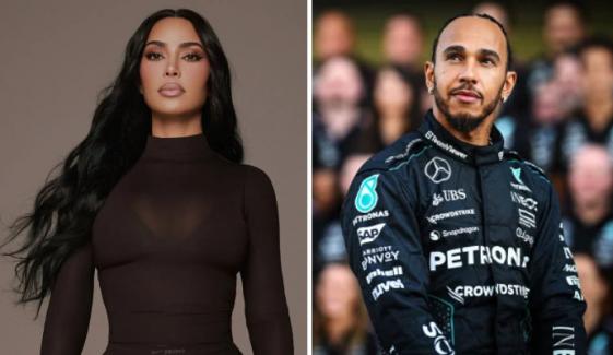 Kim Kardashian debuts plunging black look after romantic trip with Lewis Hamilton