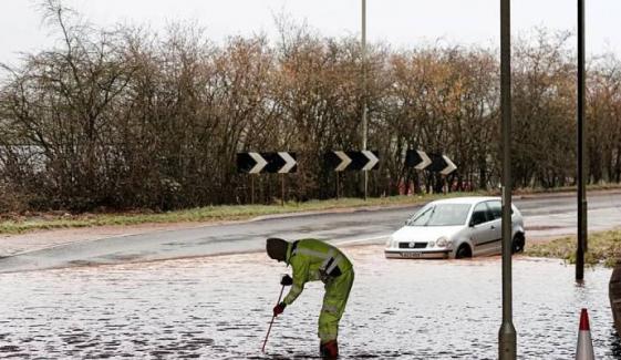 UK weather: Dozens of flood alerts issued as relentless downpours continue 