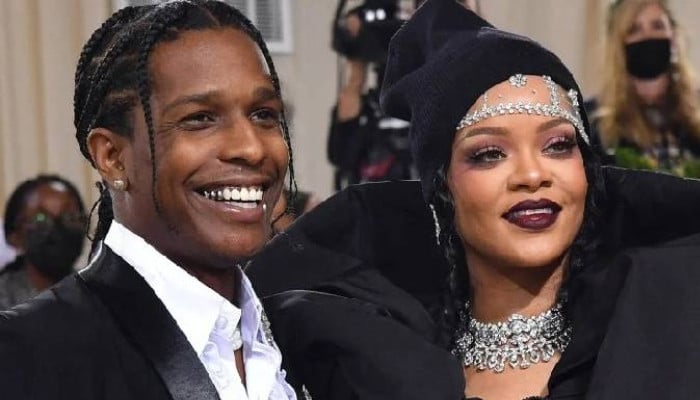 Rihanna sneaks backstage to celebrate A$AP Rocky after surprise NYFW show