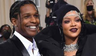 Rihanna sneaks backstage to celebrate A$AP Rocky after surprise NYFW show