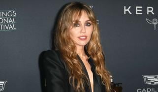 Miley Cyrus fuels ‘Hannah Montana’ hype with surprise set sighting