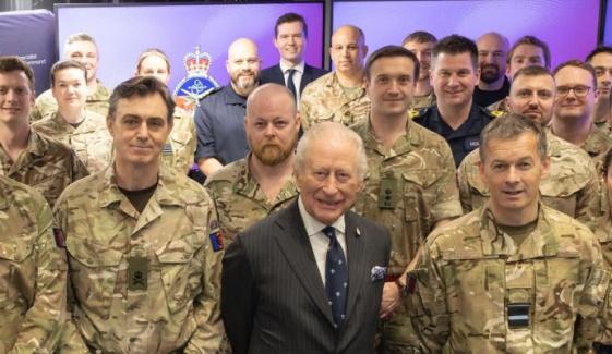 King Charles appears beaming at Northwood HQ despite mounting royal tensions