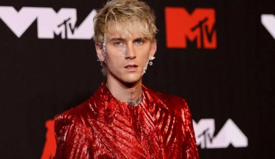 MGK concert erupts into chaos after hole in stage causes horrific fall