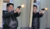 Kim Jong Un tests guns with daughter at arm factory, new hint at succession