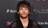 Louis Tomlinson dishes on One Direction songs he loved & hated