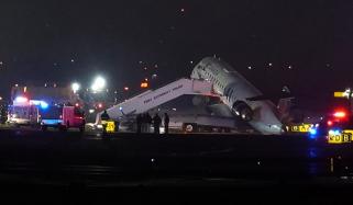 Two dead after Air Canada plane collides with ground vehicle at LaGuardia Airport 