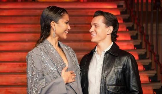 Tom Holland swoons fans by quietly melting over Zendaya during 'The Drama' premiere