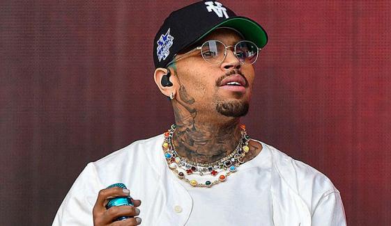 Chris Brown kiss with married woman mid concert divides fans: ‘she made a mistake'