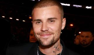 Justin Bieber shakes off Oscar drama with first surprise music gig