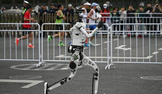 Humanoid robot outpaces human half marathon world record in Beijing
