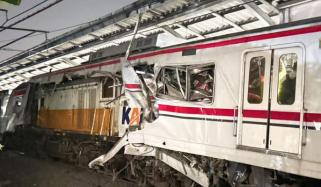 Indonesia train crash kills at least 14 as rescuers search wreckage