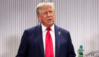 Trump shares AI image with rifle, issues warning to Iran: ‘No more Mr. Nice Guy’