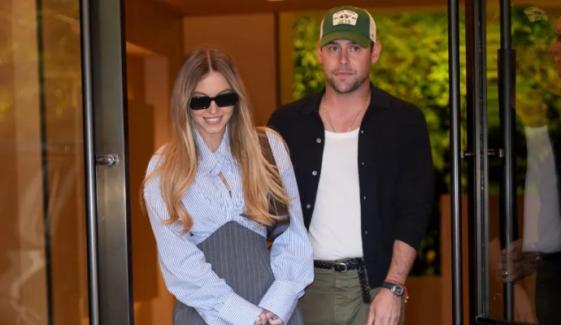 Sydney Sweeney, Scooter Braun pack on PDA as they board private jet 