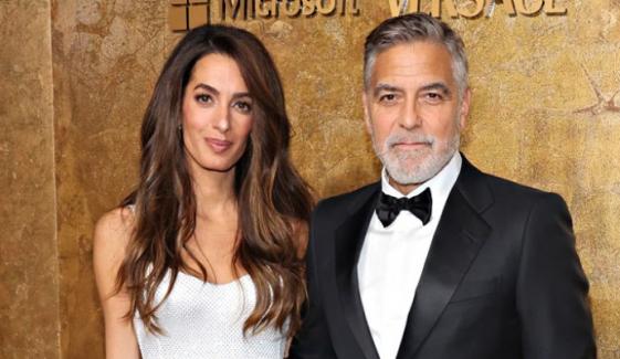 George Clooney, Amal Clooney pack on PDA during romantic 65th birthday getaway