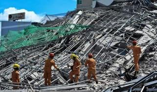 Philippines unfinished building collapse: 1 dead over 20 feared trapped 