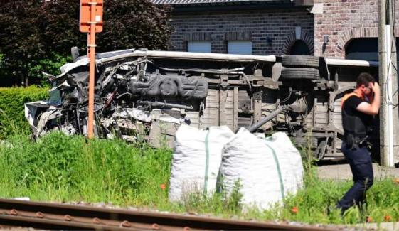 Belgium train crash: School bus collision leaves four dead including children