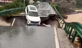 Car plunges into river after bridge collapses in China