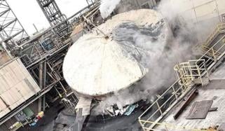 Washington packaging plant chemical tank implosion kills 1, leaves 9 missing