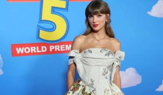 Taylor Swift performs 'You Got A Friend In Me' at 'Toy Story 5' premiere with Randy Newman 