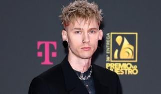 Machine Gun Kelly shares extreme body art process pushed him to limit