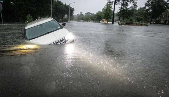 Flash floods swamp roads North of Houston as vehicles become trapped