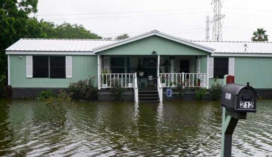 Louisiana faces severe flooding threat as Arthur loses storm status 