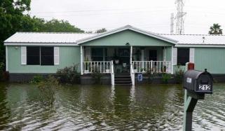 Louisiana faces severe flooding threat as Arthur loses storm status 