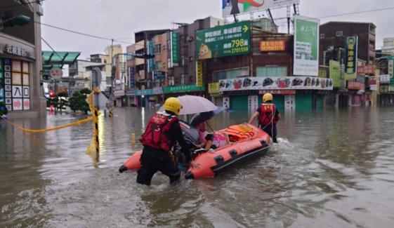 Japan: Four injured, more than 100 flights cancelled as twin storms close in 