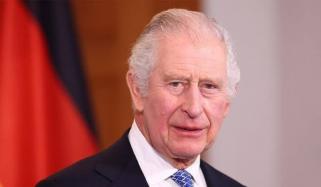 King Charles keeps composure as security responds to tense public moment