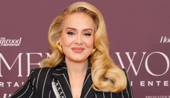 Adele gives fans a rare peek into her life with 13-year-old son Angelo