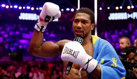 Anthony Joshua recovers from two knockdowns to knock out Kristian Prenga, pays tribute to late friends