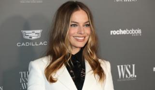 Margot Robbie brings effortless summer glam to new outing in chic yellow co-ord