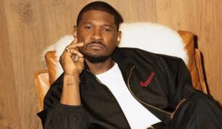Usher ends onstage fan interaction after unexpectedly awkward moment
