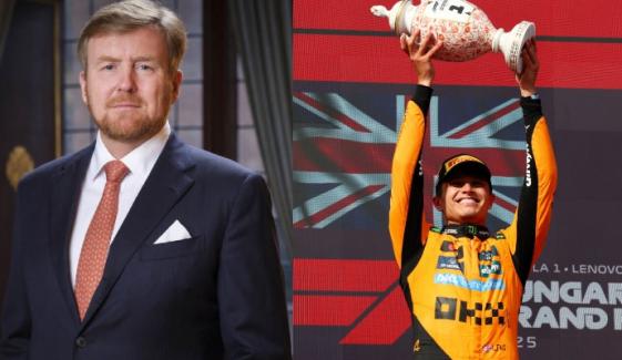 King Willem-Alexander presents Lando Norris with trophy at final Dutch GP 