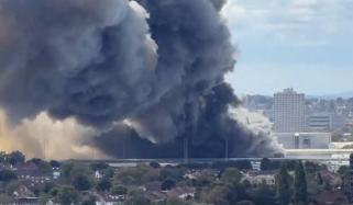 Huge fire breaks out near Wembley Stadium: 125 firefighters battle Neasden industrial estate blaze