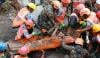 Nepal flood miracle: Crews rescue two workers from tunnel after nine days