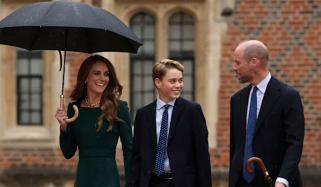 Prince George flashes a cheeky smile in first heartfelt photos from Eton College