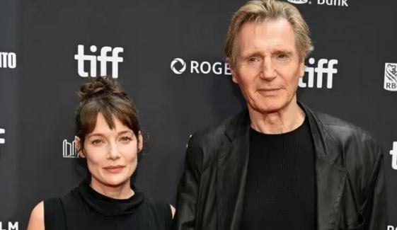 Stella Stocker, Liam Neeson raise eyebrows as they go hand-in-hand at TIFF