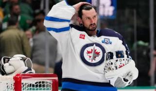 Winnipeg Jets suspend star goalie Connor Hellebuyck for missing training camp amid trade request