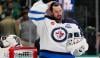 Winnipeg Jets suspend star goalie Connor Hellebuyck for missing training camp amid trade request