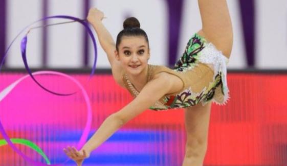 How Olympic gymnast Alina Harnasko pushes human flexibility to the limit
