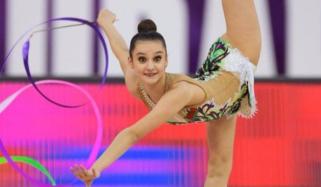 How Olympic gymnast Alina Harnasko pushes human flexibility to the limit