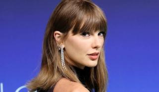 Taylor Swift just debuted even shorter hair—and her curls are doing all the talking