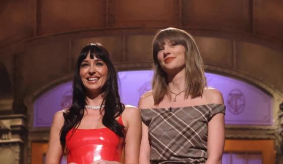 Taylor Swift brings chic fall glamour to Dakota Johnson’s ‘SNL’ cameo: See