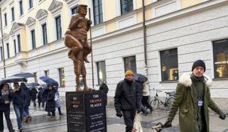 Trump's naked golden statue unveiled at European parliament: ‘Orange plague’